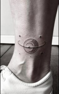 Saturn tattoo 1