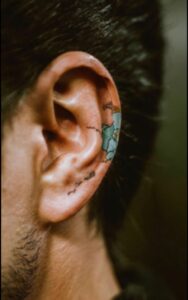 male behind the ear tattoo 7