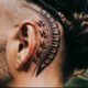 male behind the ear tattoo cover