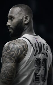 LeBron tattoos arm - LeBron tattoos back - LeBron James' tattoos high School - LeBron tattoos meaning - lebron james hand tattoo - LeBron tattoo lion