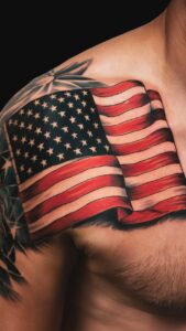 American flag shoulder tattoos men American flag shoulder tattoos male American flag tattoo black and white American flag shoulder tattoos for guys American flag shoulder tattoos meaning American flag tattoos