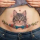 belly button cat tattoo