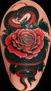 Snake and rose tattoo meaning Snake and rose tattoos small Snake and rose tattoos on hand Snake and rose tattoo men Snake and rose tattoo meaning on a woman Snake and rose tattoos simple