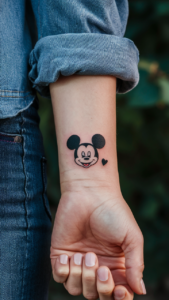 Mickey mouse tattoos small Mickey Mouse Tattoos for guys Mickey Mouse tattoo on hand Mickey mouse tattoos with names Mickey Mouse tattoo black and white Mickey Mouse Tattoo meaning