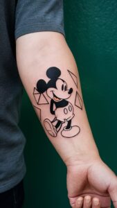 Mickey mouse tattoos small Mickey Mouse Tattoos for guys Mickey Mouse tattoo on hand Mickey mouse tattoos with names Mickey Mouse tattoo black and white Mickey Mouse Tattoo meaning