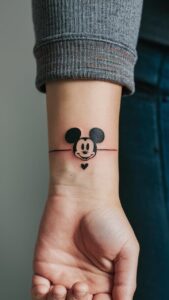 Mickey mouse tattoos small Mickey Mouse Tattoos for guys Mickey Mouse tattoo on hand Mickey mouse tattoos with names Mickey Mouse tattoo black and white Mickey Mouse Tattoo meaning