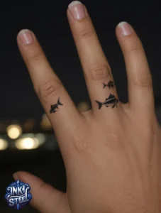 Simple fish tattoo small - Simple fish tattoo meaning - Simple fish tattoo on hand - Simple fish tattoo ideas - Small fish tattoos for Guys - Simple fish tattoos for females